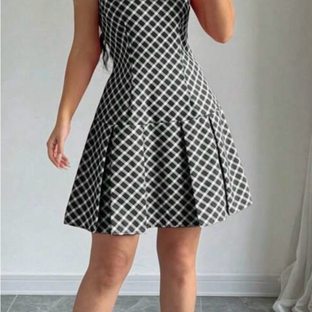 Chic and Versatile Black and White Patterned Mini Dress
